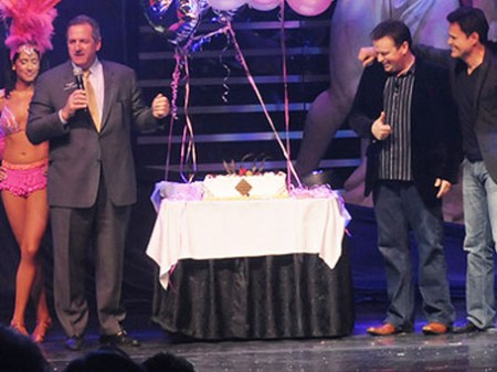 a group of people standing on a stage